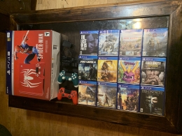 LIMITED EDITION Spider-Man PLAYSTATION 4 PRO with Games and Controllers